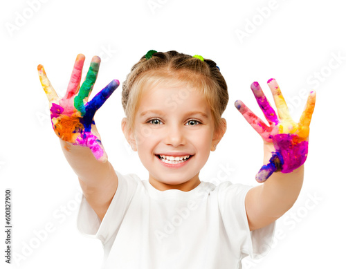 beautiful little girl with her         hands in the paint