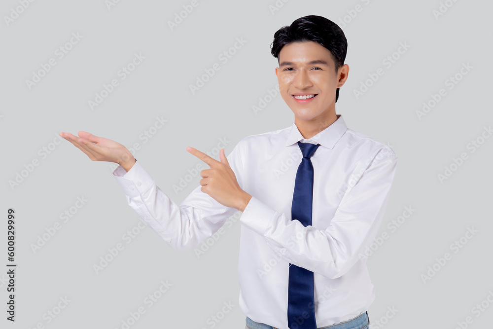 Portrait young asian business man pointing and presenting isolated on white background, advertising and marketing, executive and manager, businessman confident showing something with expression. Portrait young asian business man pointing and presenting isolated on white background, advertising and marketing, executive and manager, businessman confident showing something with expression.