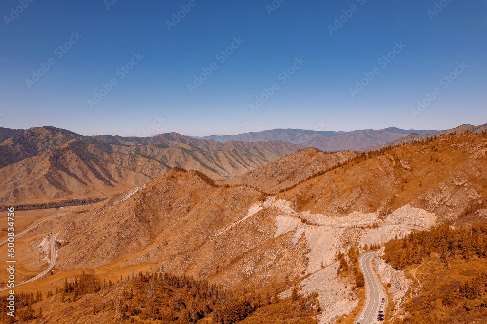 Aerial view Autumn landscape travel of Altai mountains Russia meander road