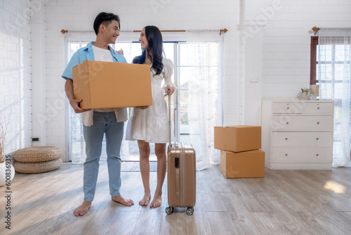 Asian couple moving into a new home, Beginning of a married life.