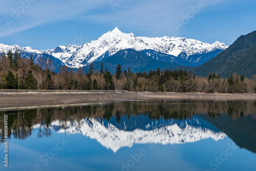 Landscape of Snow-covered Mount Shuksan Reflected in Baker Lake from the Upper Baker Dam Area in the North Cascades National Park in Whatcom County, Washington, USA