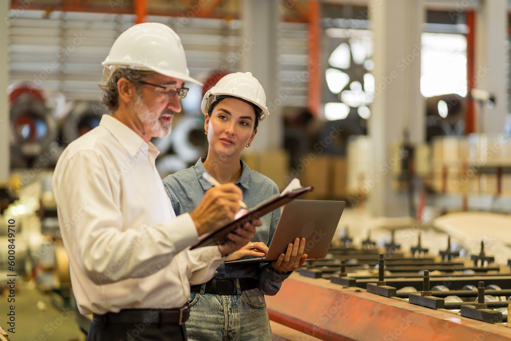 A new generation of engineers in a metal sheet factory. Studying work methods from supervisors or colleagues and studying by yourself be taught professionally A new generation of engineers in a metal sheet factory. Studying work methods from supervisors or colleagues and studying by yourself be taught professionally
