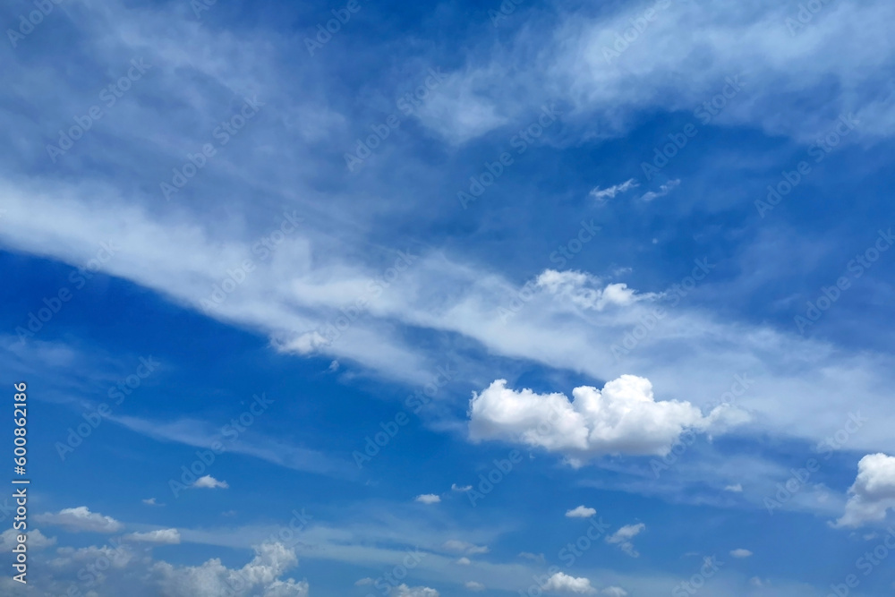 Blue sky with white clouds.  Cloudscape background.  Beautiful morning sky with fluffy clouds.  Concept of new life beginning, freedom of life and peaceful.