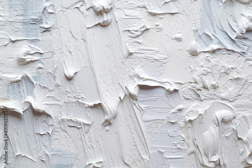 Weiße Paste, Ölfarbe, Gips auf Wand mit Struktur photo