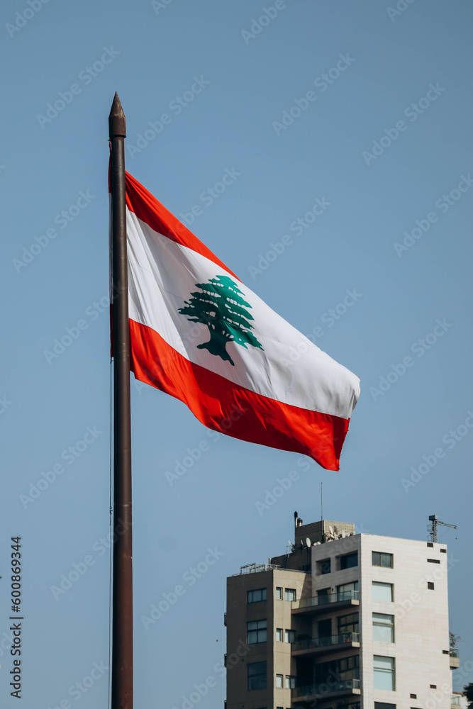 The Lebanese flag in the center of Beirut fluttering in the wind