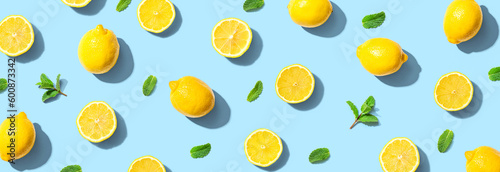 Fresh yellow lemons with mints overhead view - flat lay