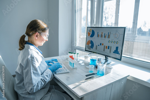 A biologist uses computer programs to analyze research in a medical laboratory. A medical scientist analyzes data on his computer in a pharmaceutical laboratory to develop new drugs.