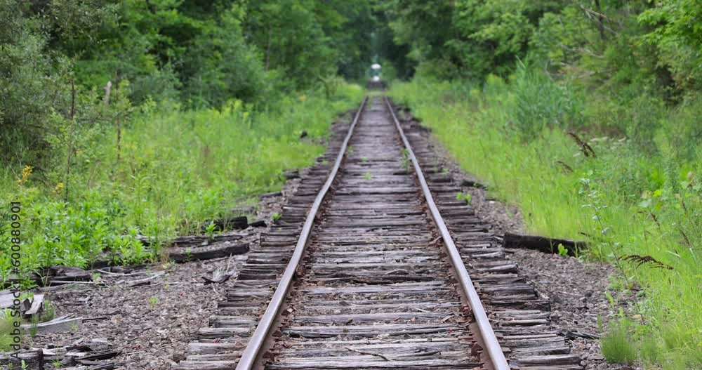 Old train tracks in Ohio countryside during summer time. Old train tracks in Ohio countryside during summer time.