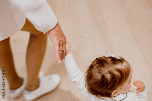 baby feet and hands small shoes elegant sneakers for baby socks  photo
