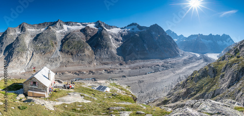 panoramic view with Lauteraarhütte and Unteraargletscher on a sunny summer day