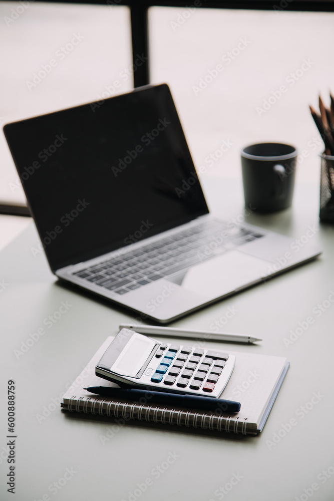 Entrepreneur Asian businessman and businesswoman discussing new business project in tablet in modern Meeting In Modern Office, Asian business casual concept. Entrepreneur Asian businessman and businesswoman discussing new business project in tablet in modern Meeting In Modern Office, Asian business casual concept.