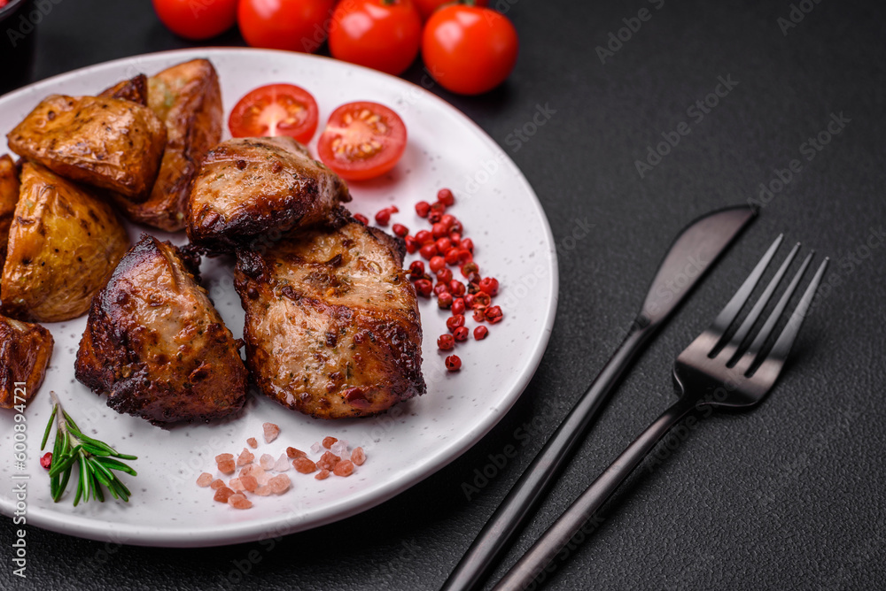 Delicious grilled meat in the form of a kebab with spices and herbs
