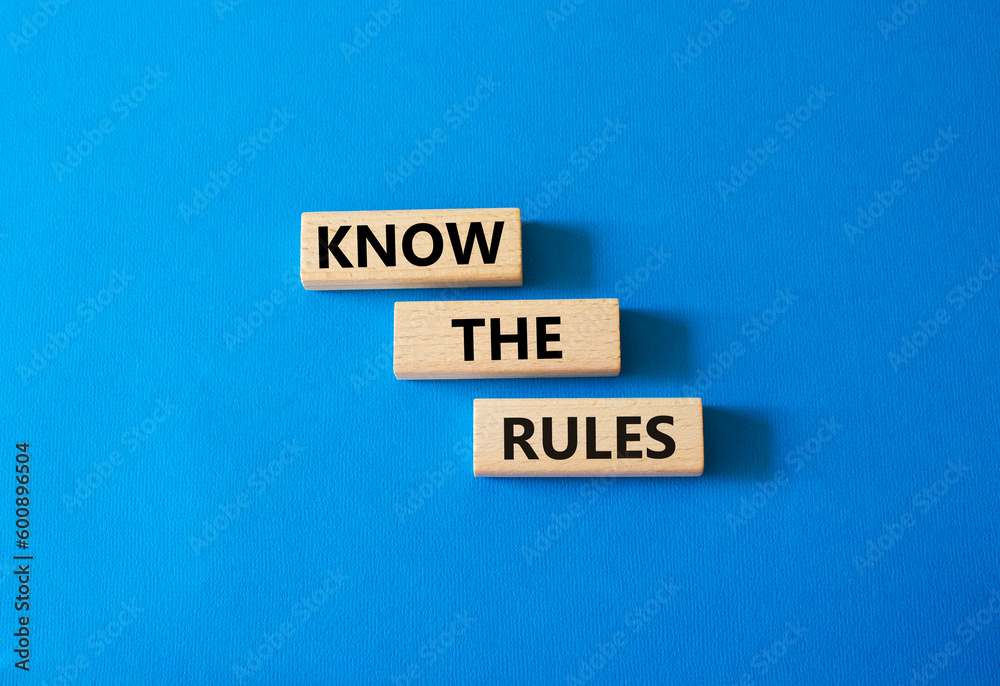 Know the rules symbol. Wooden blocks with words Know the rules. Beautiful blue background. Business and Know the rules concept. Copy space. Know the rules symbol. Wooden blocks with words Know the rules. Beautiful blue background. Business and Know the rules concept. Copy space.