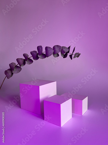 Mockup for products for skin or hair care.Abstract empty white podium on pink background. Studio photo