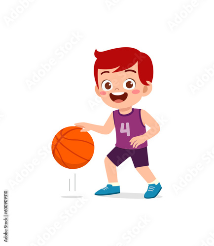 little kid play basketball and feel happy