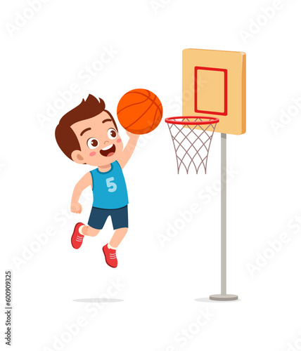 little kid play basketball and feel happy