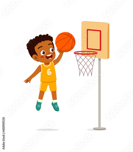 little kid play basketball and feel happy