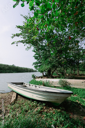 Boats on the river bank and beautiful sunny day. Colombia. photo