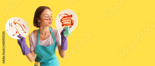 Young woman with cleaning s...