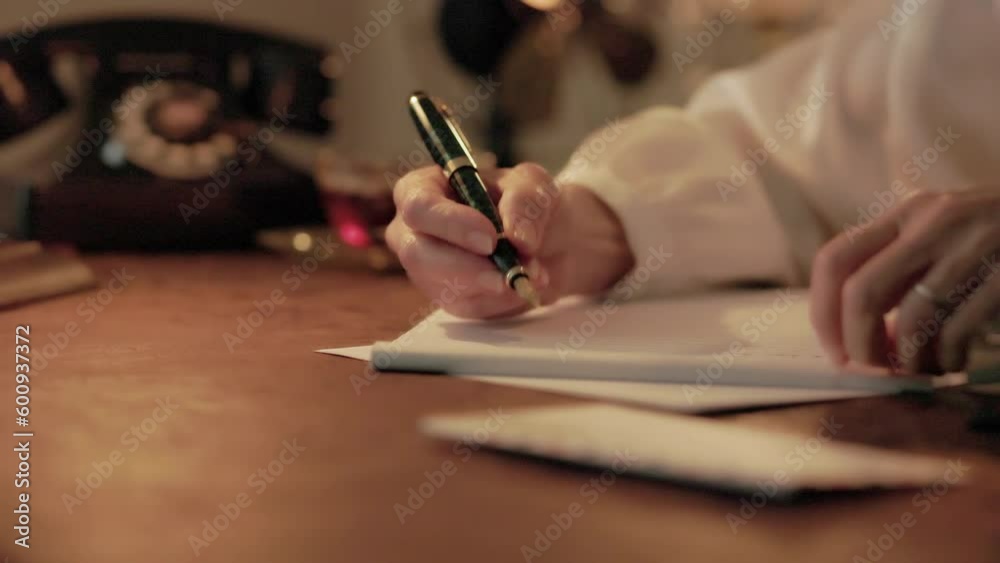 Woman writing with fountain pen 1940s