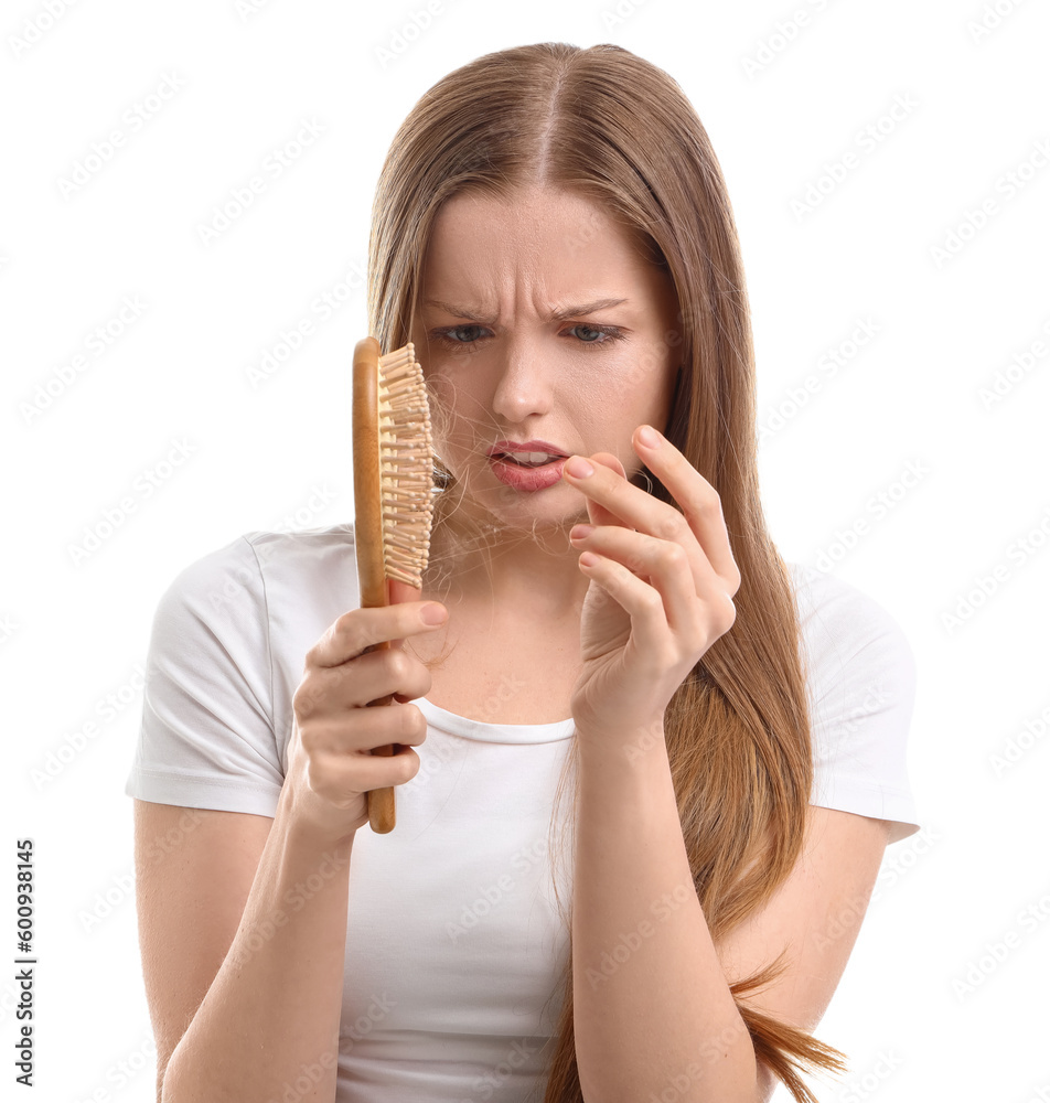 Worried young woman with hair loss problem on white background Worried young woman with hair loss problem on white background