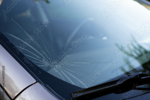 broken car windshield, chipped and damaged car glass, copy space