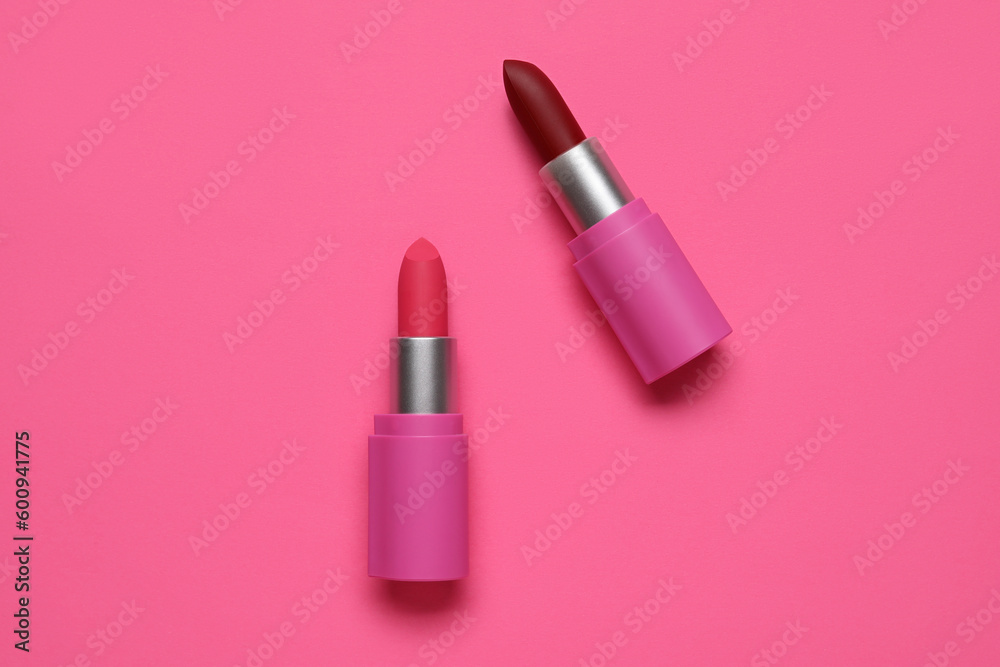 Different lipsticks on pink background Different lipsticks on pink background