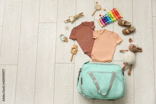 Stylish bag with clothes an...