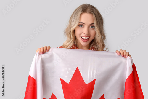 Young woman with flag of Ca...