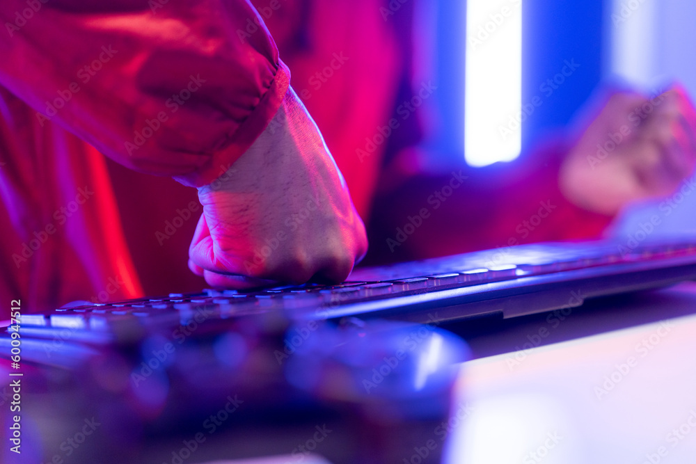 Angry gamer man destroy keyboard. Playing computer pc. He lose in the ...