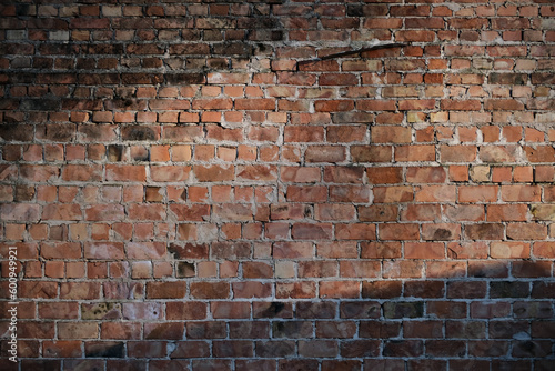 Brick wall texture background with shadow and copy space for text.