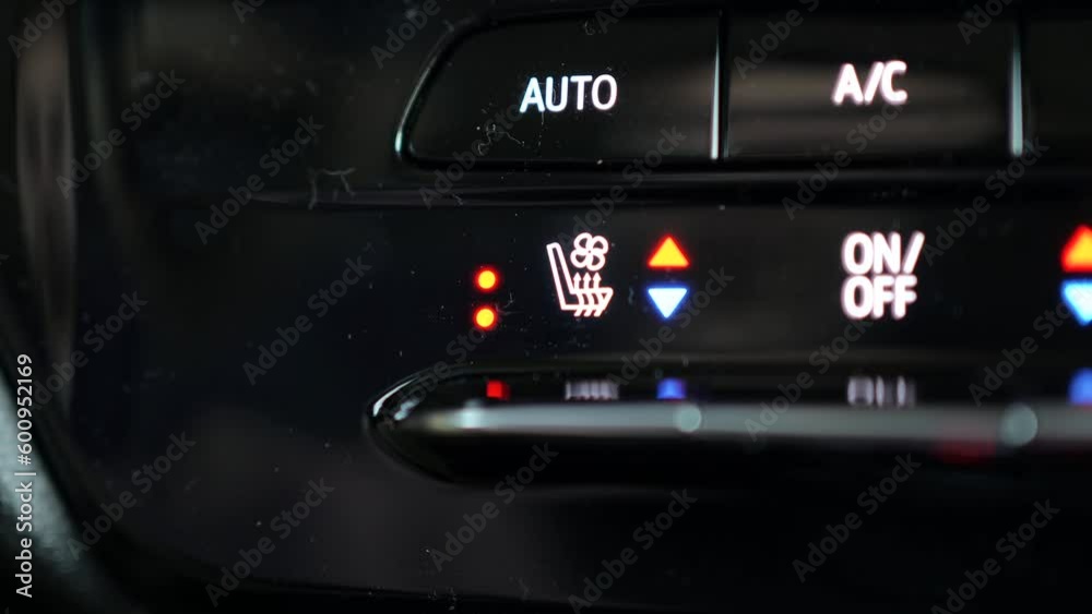Using the Heated and Cooled Car Seats Option by Pressing the Button Using the Heated and Cooled Car Seats Option by Pressing the Button