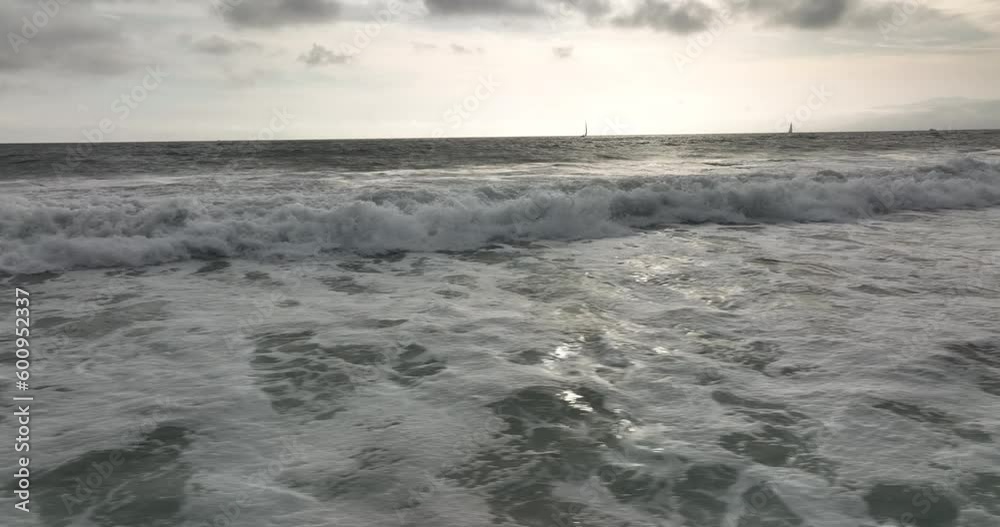 Pacific ocean, sea splashing wave, texture of sea foam. Flying by drone, top aerial view. Pacific ocean, sea splashing wave, texture of sea foam. Flying by drone, top aerial view.