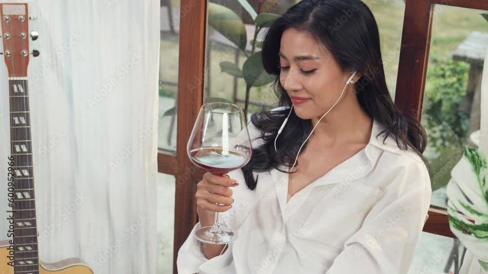 Top view of Sexy and elegance female is enjoy drinking a glass of wine celebrate weekend relaxing successful life. Evening comfort and cozy moment alone. Reward yourself. Classic and chill window. Top view of Sexy and elegance female is enjoy drinking a glass of wine celebrate weekend relaxing successful life. Evening comfort and cozy moment alone. Reward yourself. Classic and chill window.