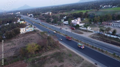 Dynamic FPV aerial view of Mumbai Pune Bangalore Highway at Sunset near Davangere in Karnataka, India photo