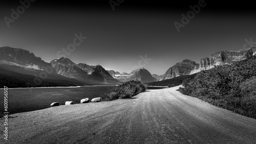 Black and White Photo of the gravel road along Lake Sherburne in the Many Glaciers area of Glacier National Park, Montana, USA photo