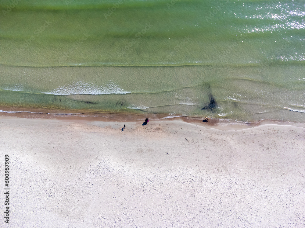 Aerial view landscape Poland Gdynia. Above on empty beach, green water, Baltic sea.