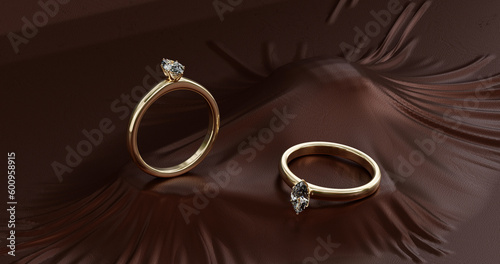 3d render of gold ring with diamonds onon maroon fabric background. photo