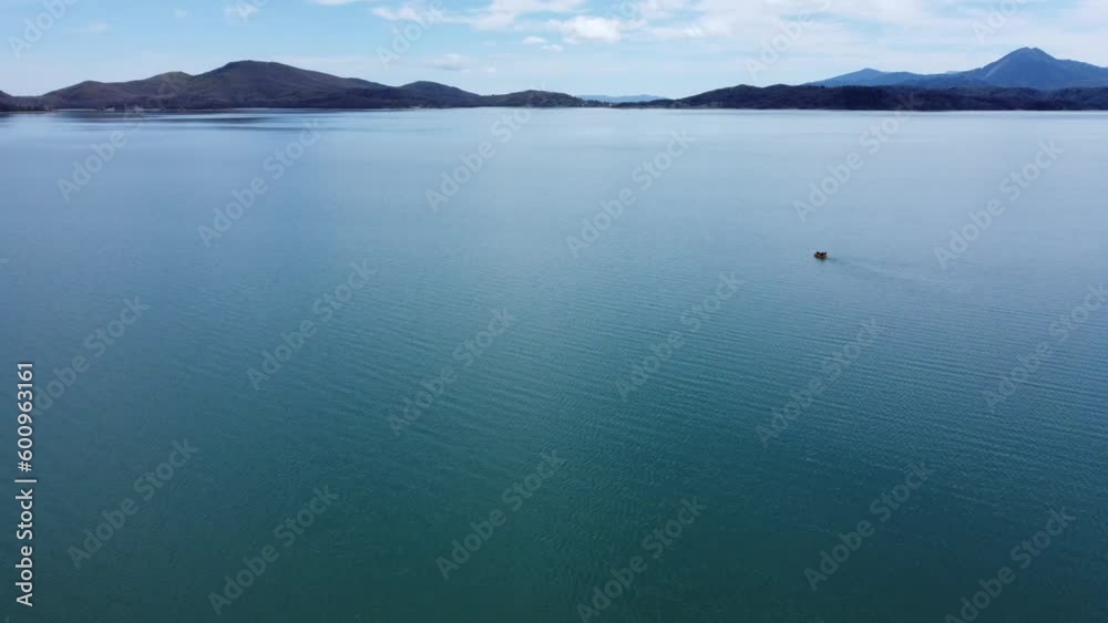 High resolution drone shot of lake Plastira and the surrounding mountains in Greece | 4K High resolution drone shot of lake Plastira and the surrounding mountains in Greece | 4K