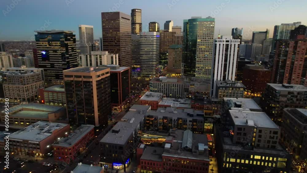 Aerial over the Denver skyline at dusk, Colorado, USA. Drone orbit shot Aerial over the Denver skyline at dusk, Colorado, USA. Drone orbit shot