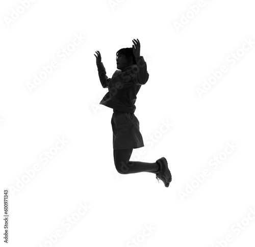 ジャンプする女の子のシルエット