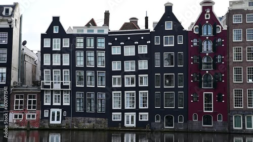 Old Historical Houses At The Canal Around Damrak Amsterdam The Netherlands 14-3-2022