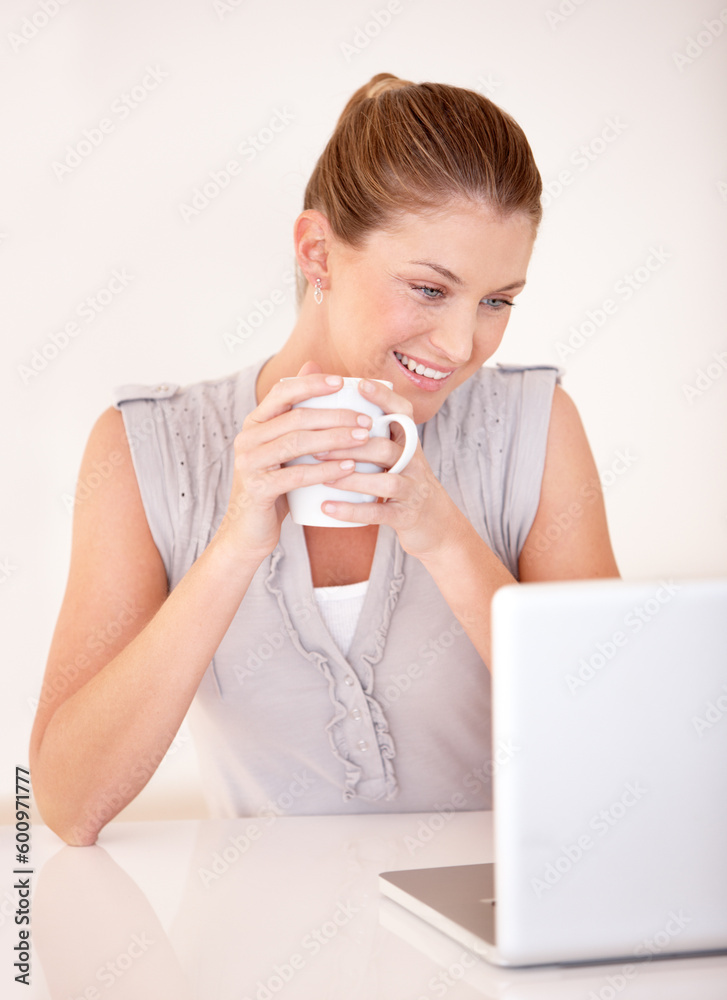 Relax, coffee and smile with woman and laptop for social media, streaming and website. Technology, internet and networking with female freelancer online at home for remote work, tea and email Relax, coffee and smile with woman and laptop for social media, streaming and website. Technology, internet and networking with female freelancer online at home for remote work, tea and email