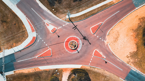 Roundabout on road with power lines in Guilderton, Western Australia, Australia photo