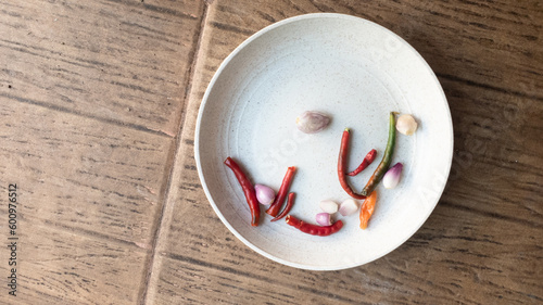 fresh spices on white plate