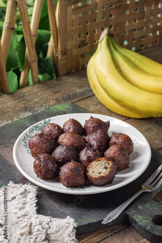 Malaysian fritter snack deep fried banana balls or Malay as Cekodok Pisang