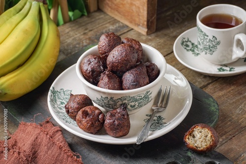 Malaysian fritter snack deep fried banana balls or Malay as Cekodok Pisang