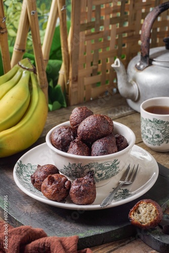 Malaysian fritter snack deep fried banana balls or Malay as Cekodok Pisang photo