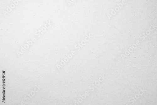 White cardboard craft paper background. Grey paper texture, old vintage page or grunge. 