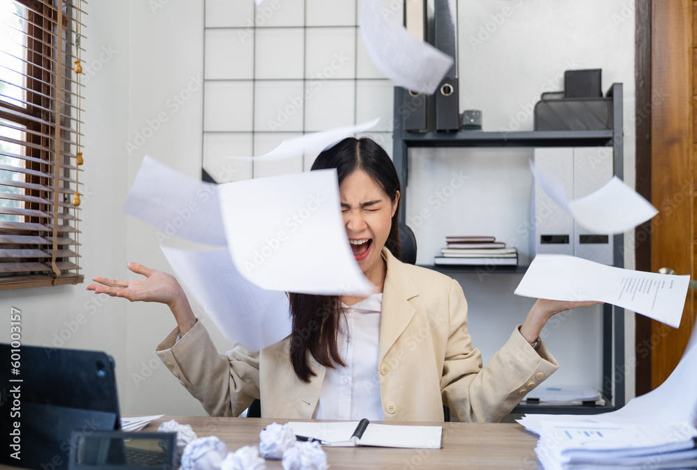 Businesswoman sitting with head in hands at desk covered crumpled papers. Office worker tired of too much difficult unproductive work. Stressed female entrepreneur has no idea what to do with problem - obrazy, fototapety, plakaty 